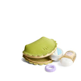 Wasabi Small | Curved leather pouch with zipper and scalloped edges