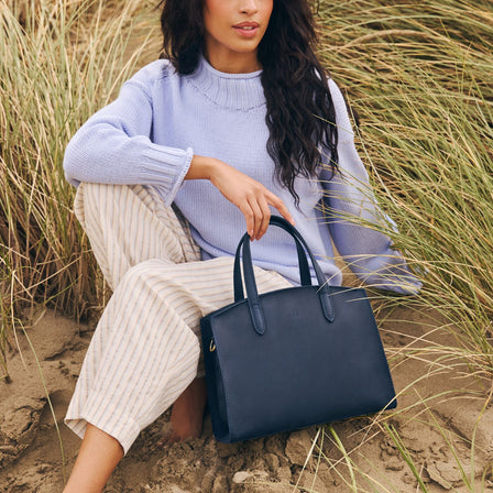 Deep Water*Mini | Leather tote bag with handles, adjustable crossbody strap, zipper top, and a back pocket