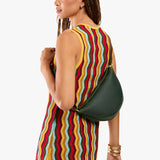 Evergreen Medium | Model wearing petite half circle shaped sling bag