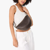 Classic Mix Mystery Box | Model wearing Medium Koala Sling Bag on front