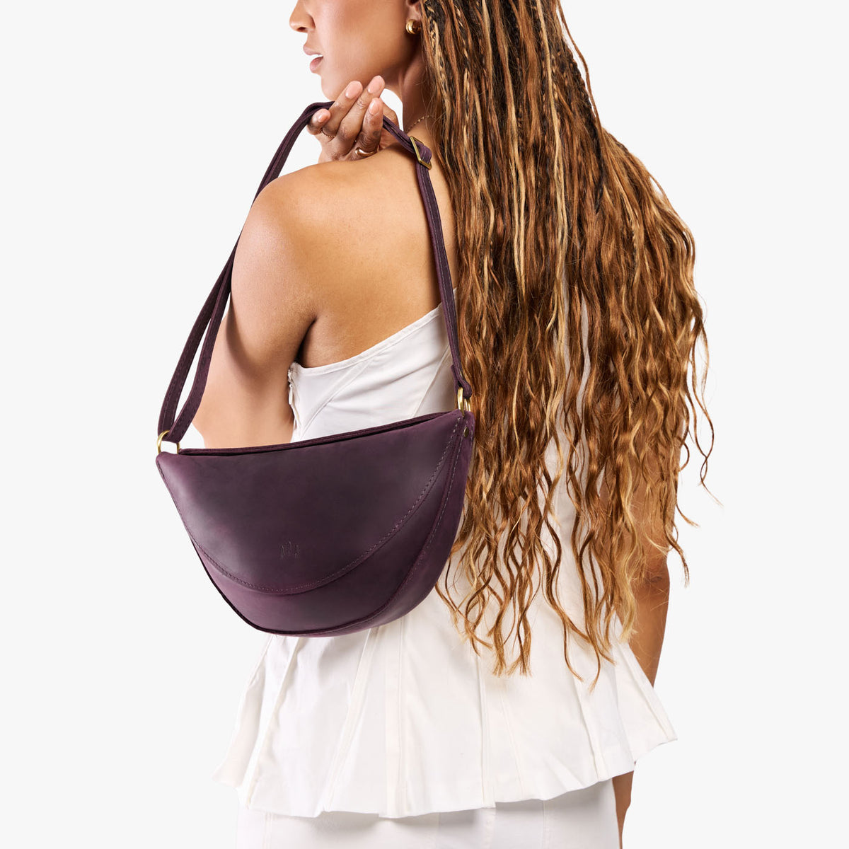 Larkspur*Medium | Model wearing petite half circle shaped sling bag