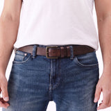 Java | A model wearing a mens leather belt with two belt loops and antiqued brass buckle
