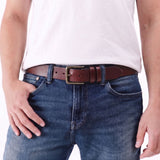 Pecan | A model wearing a mens leather belt with two belt loops and antiqued brass buckle