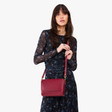 Berry Good Medium | Model Wearing Small Leather Crossbody Bag with Magnetic Messenger Bag Closure