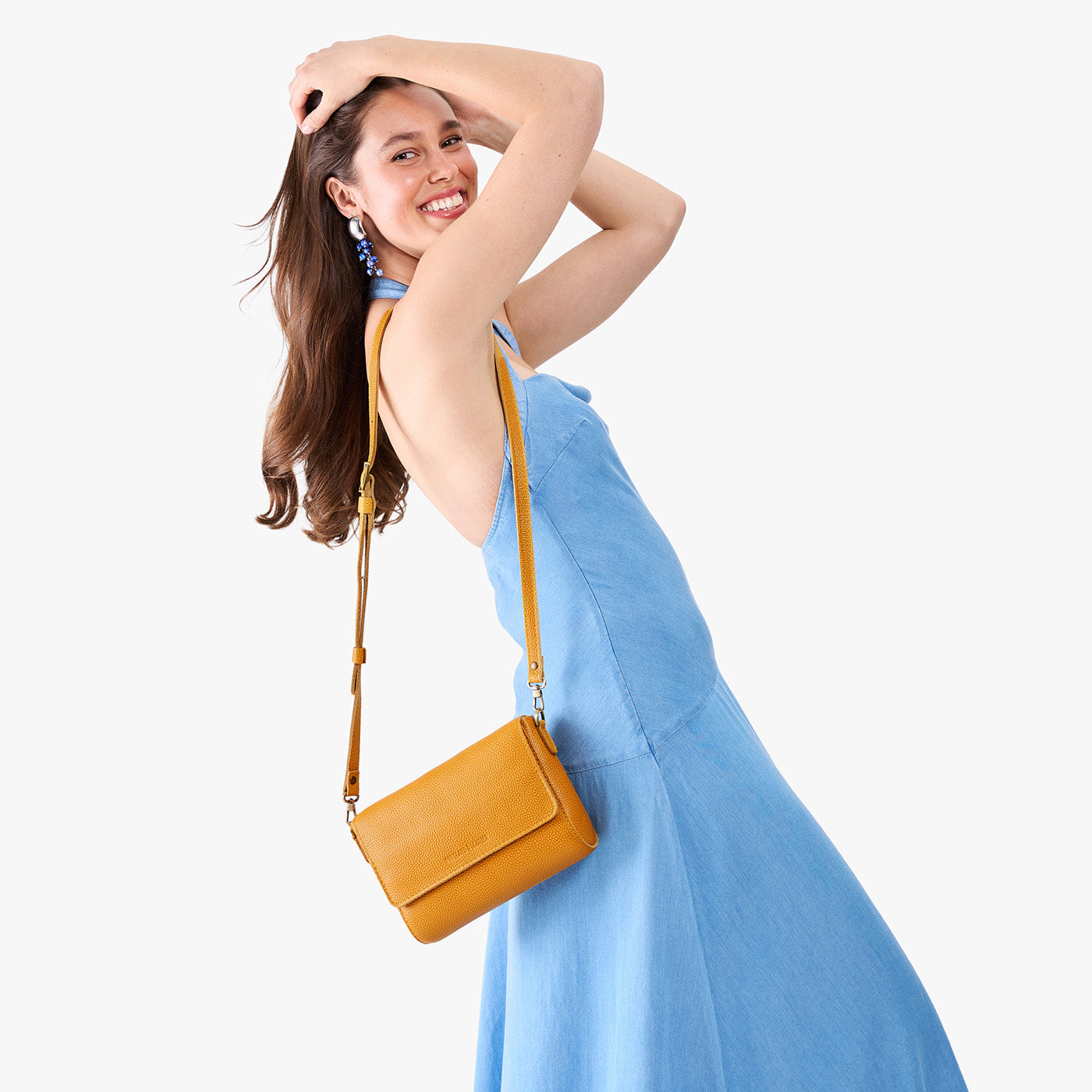 Sunshine*Medium | Model Wearing Small Leather Crossbody Bag with Magnetic Messenger Bag Closure