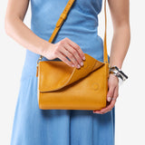Sunshine Medium | Model Wearing Small Leather Crossbody Bag with Magnetic Messenger Bag Closure