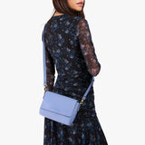 Aster Mini | Model Wearing Small Leather Crossbody Bag with Magnetic Messenger Bag Closure