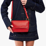 Poppy Red Mini | Model Wearing Small Leather Crossbody Bag with Magnetic Messenger Bag Closure