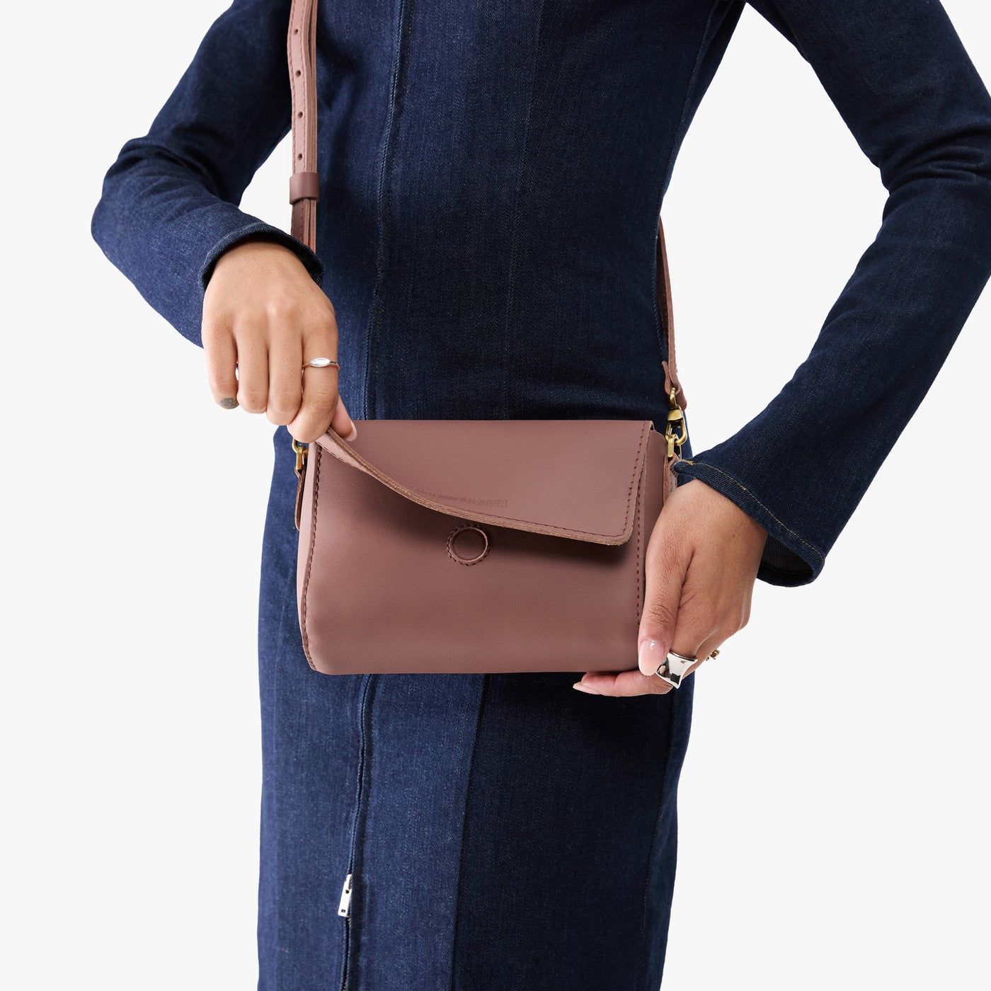 Sunkissed*Mini | Model holding Small Leather Crossbody Bag with Magnetic Messenger Bag Closure