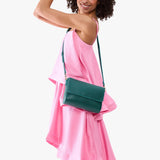 Sea Glass Medium | Model Wearing Leather Crossbody Bag with Magnetic Messenger Bag Closure