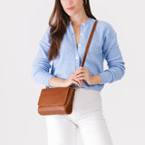 Meadow Medium | Model Wearing Leather Crossbody Bag with Magnetic Messenger Bag Closure