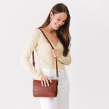 All Variants | Model wearing a Medium Nutmeg Metro Crossbody