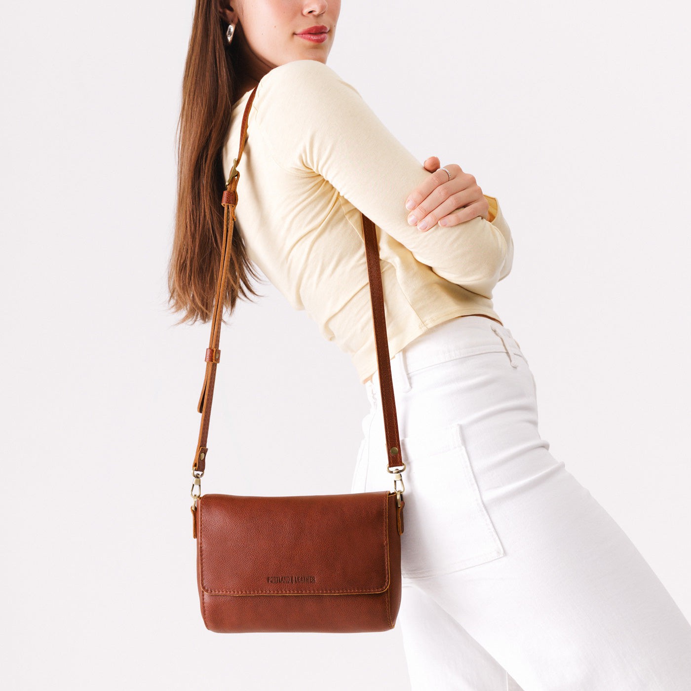 Nutmeg*Medium | Model Wearing Leather Crossbody Bag with Magnetic Messenger Bag Closure