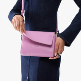 Calla Lily Mini | Model Wearing Small Leather Crossbody Bag with Magnetic Messenger Bag Closure