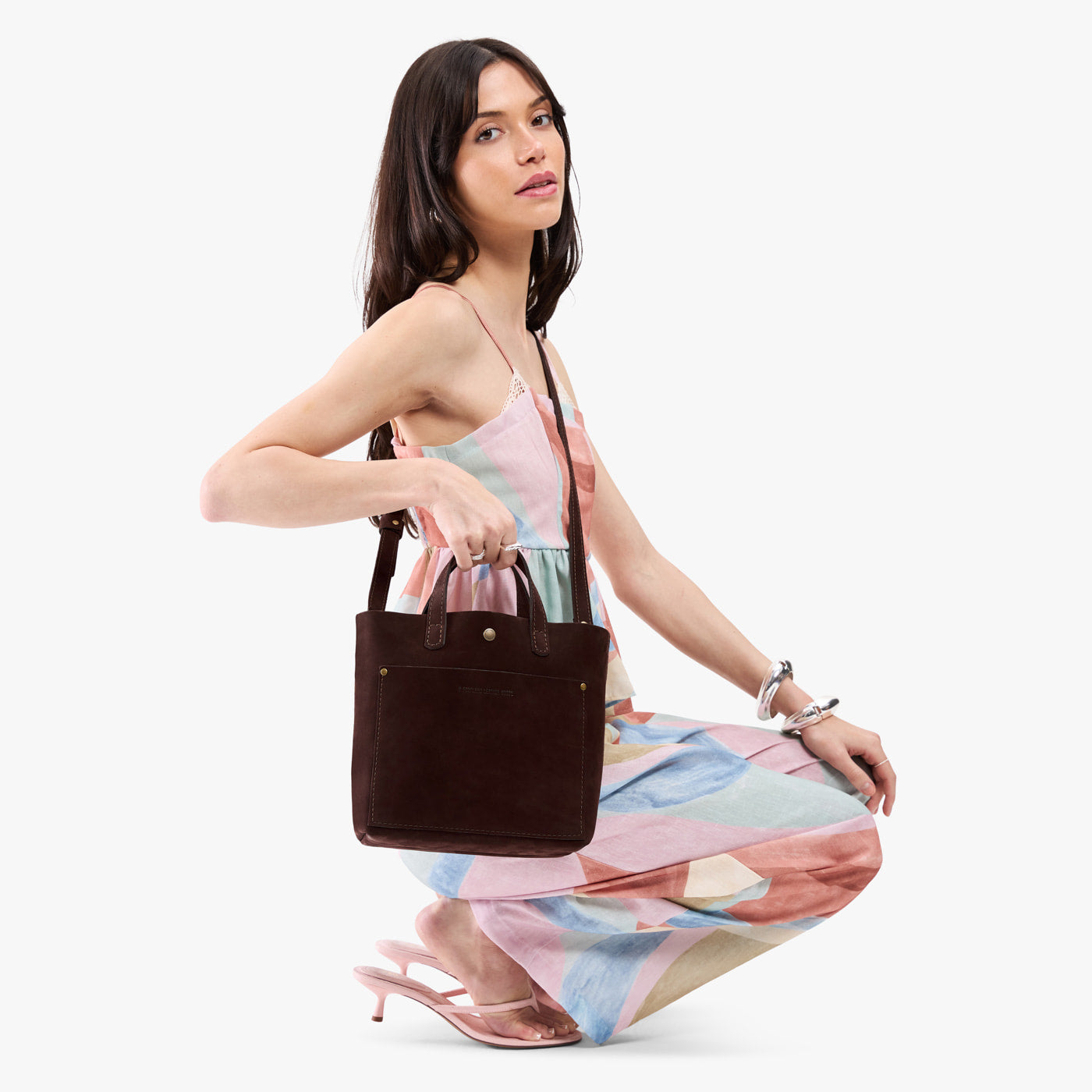 Velvet Brown*Classic | Model carrying crossbody tote bag with snap closure and front pocket