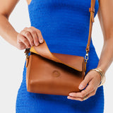 Honey Mini | Model Wearing Small Leather Crossbody Bag with Magnetic Messenger Bag Closure