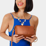 Honey Mini | Model Wearing Small Leather Crossbody Bag with Magnetic Messenger Bag Closure