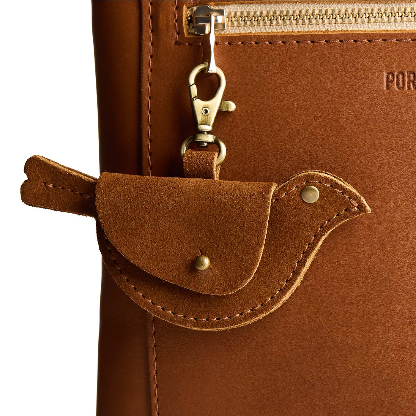 Jackson | Bird shaped pouch with button closure and lobster clasp