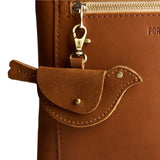 Jackson | Bird shaped pouch with button closure and lobster clasp