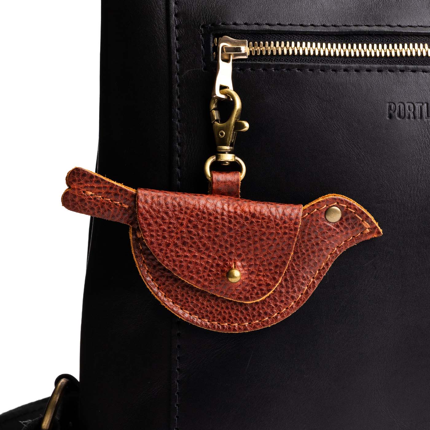 Nutmeg | Bird shaped pouch with button closure and lobster clasp