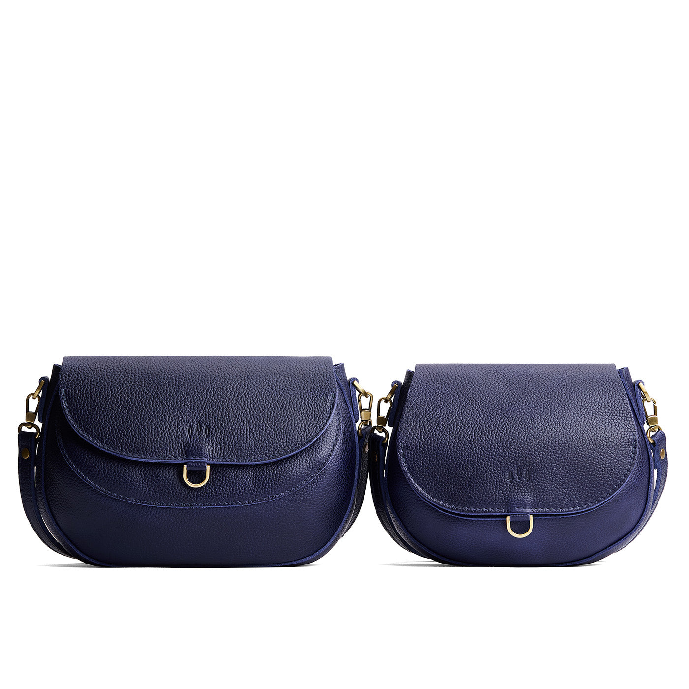 Cobalt | Size comparison of two leather Crossbodies with a flaps and magnetic closures