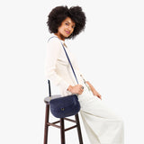 Cobalt Large | Model wearing a leather Crossbody with a flap and magnetic closure
