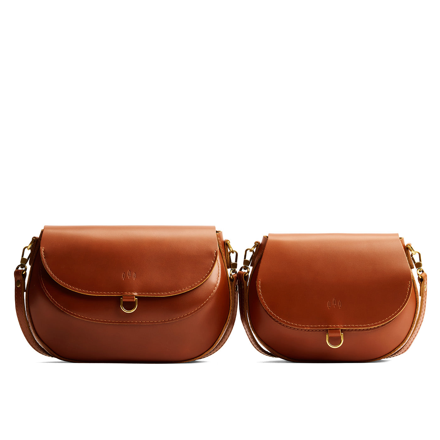 Madrone | Size comparison of two leather Crossbodies with a flaps and magnetic closures