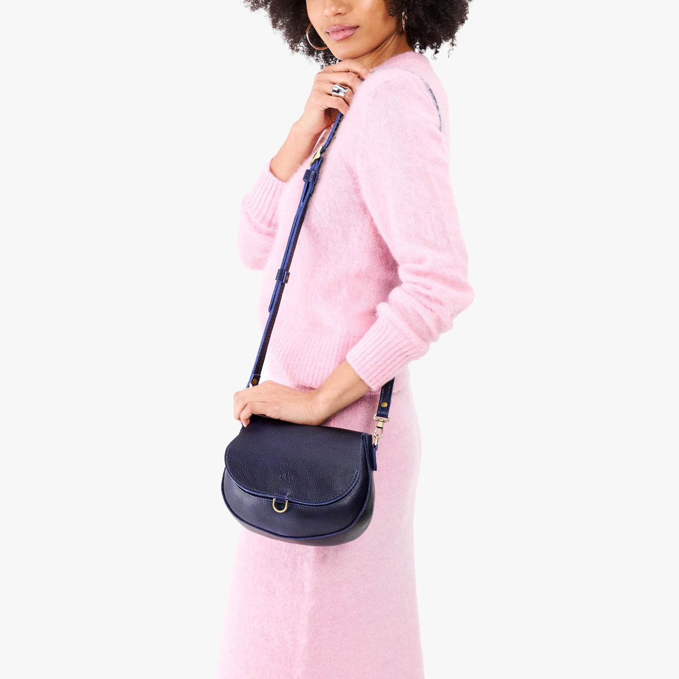 Cobalt*Small | Model wearing a petite leather Crossbody with a flap and magnetic closure