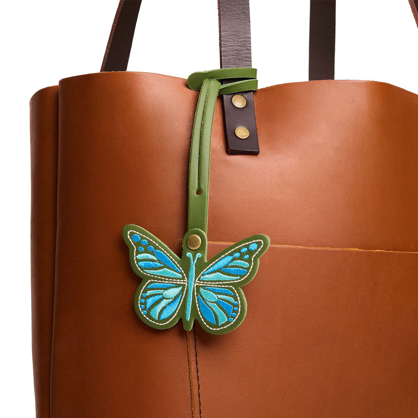 Cactus | Embroidered butterfly tassel accessory on a bag