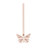 Oatmilk | Embroidered butterfly tassel accessory on a bag