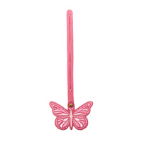 Wild Rose | Embroidered butterfly tassel accessory on a bag