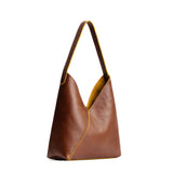 Mid-size shoulder bag with magnetic snap closure