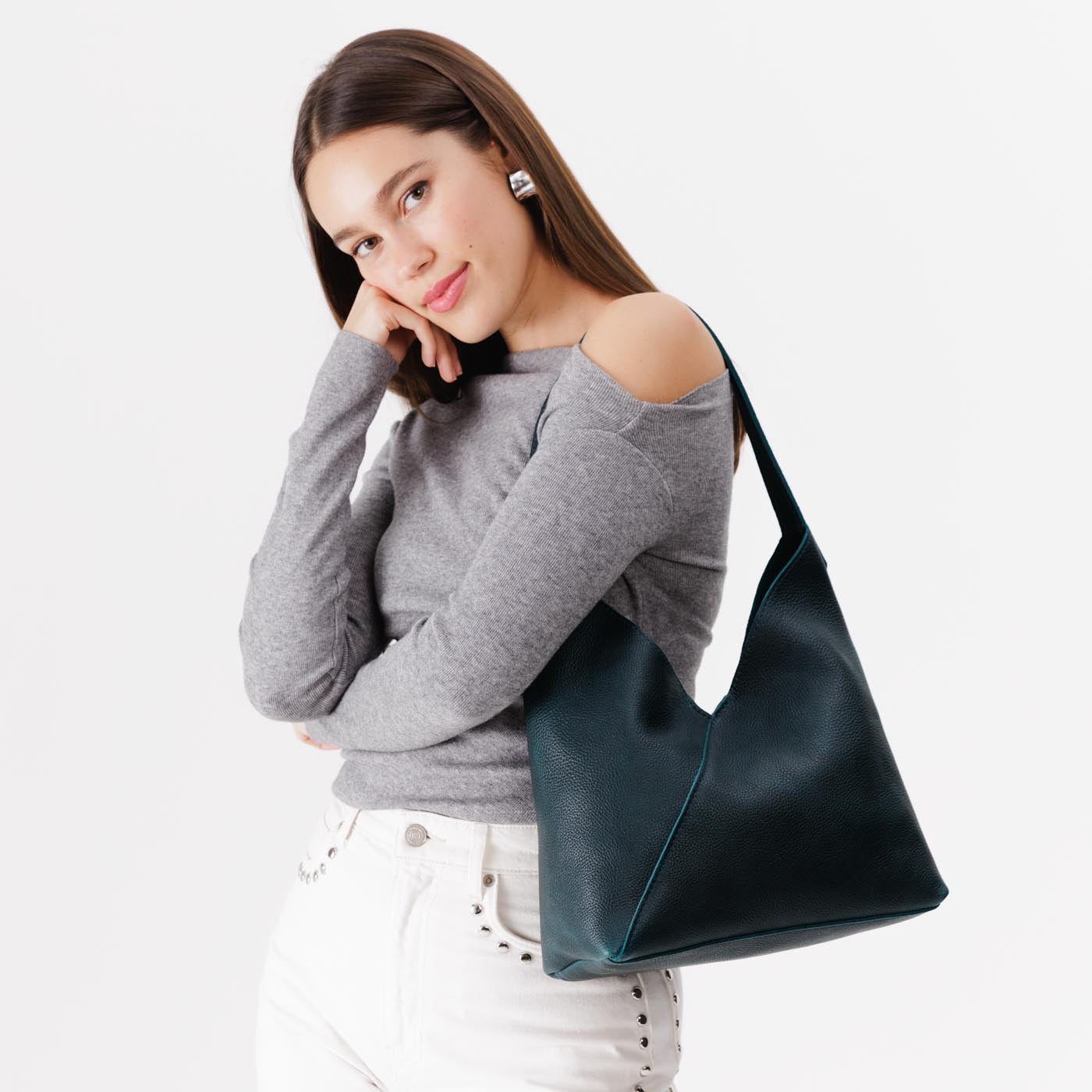 Boreal*Large | Model wearing mid-size shoulder bag with magnetic snap closure