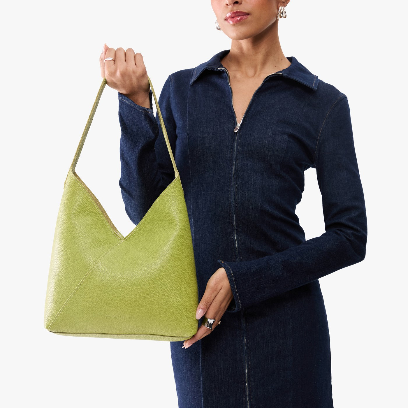 Wasabi*Large | Model wearing mid-size shoulder bag with magnetic snap 