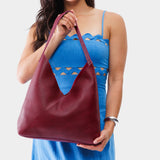 Orchid Oversized | Model wearing large shoulder bag with magnetic snap 