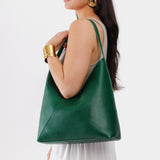 Bacalar Oversized | Model wearing large shoulder bag with magnetic snap closure