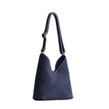 petite shoulder bag with adjustable strap and magnetic snap closure