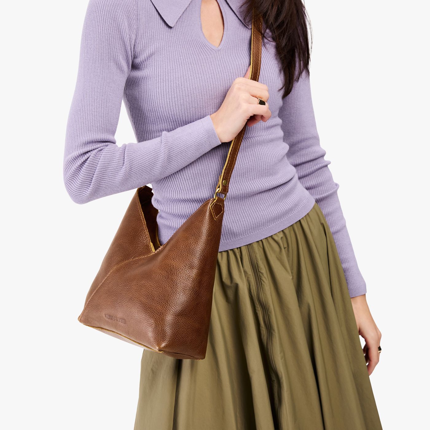 Asheville*Small | Model wearing petite shoulder bag with adjustable strap and magnetic snap closure