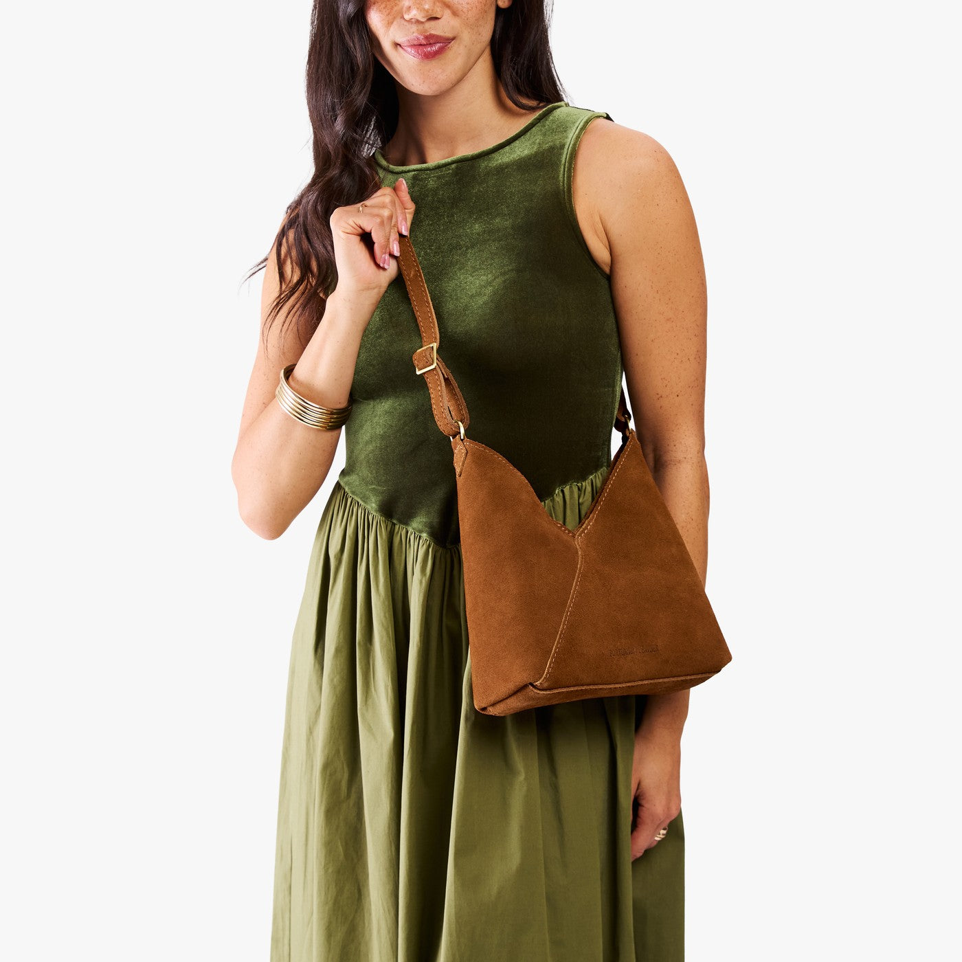 Jackson*Small | Model wearing petite shoulder bag with adjustable strap and magnetic snap closure