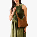 Jackson Small | Model wearing petite shoulder bag with adjustable strap and magnetic snap closure