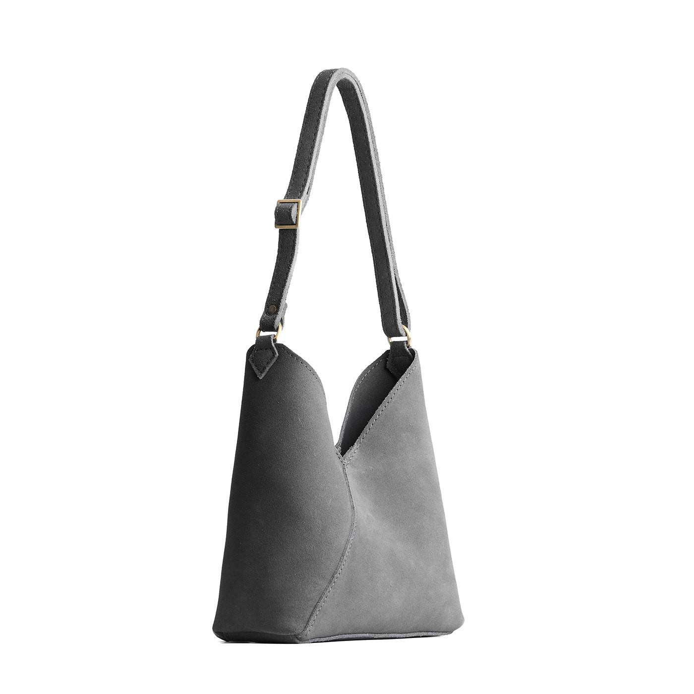 petite shoulder bag with adjustable strap and magnetic snap closure