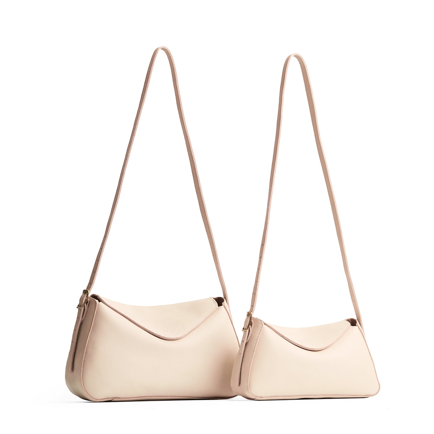 Pebbled Bone | Size comparison image of small and medium Neruda Crossbody