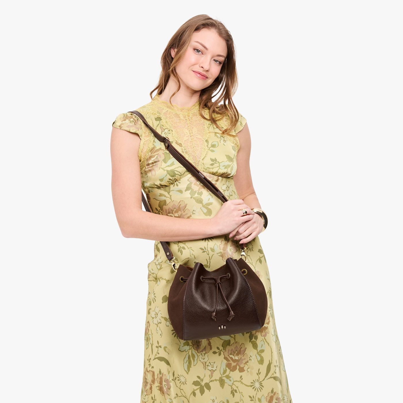 Coldbrew | Model wearing bucket bag with cinched drawstring closure