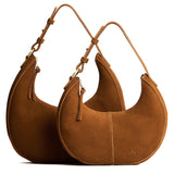 Jackson | Crescent shaped shoulder bag with zipper closure and adjustable strap