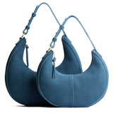 Mariner Blue | Crescent shaped shoulder bag with zipper closure and adjustable strap