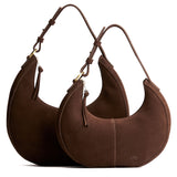 Stagecoach | Crescent shaped shoulder bag with zipper closure and adjustable strap