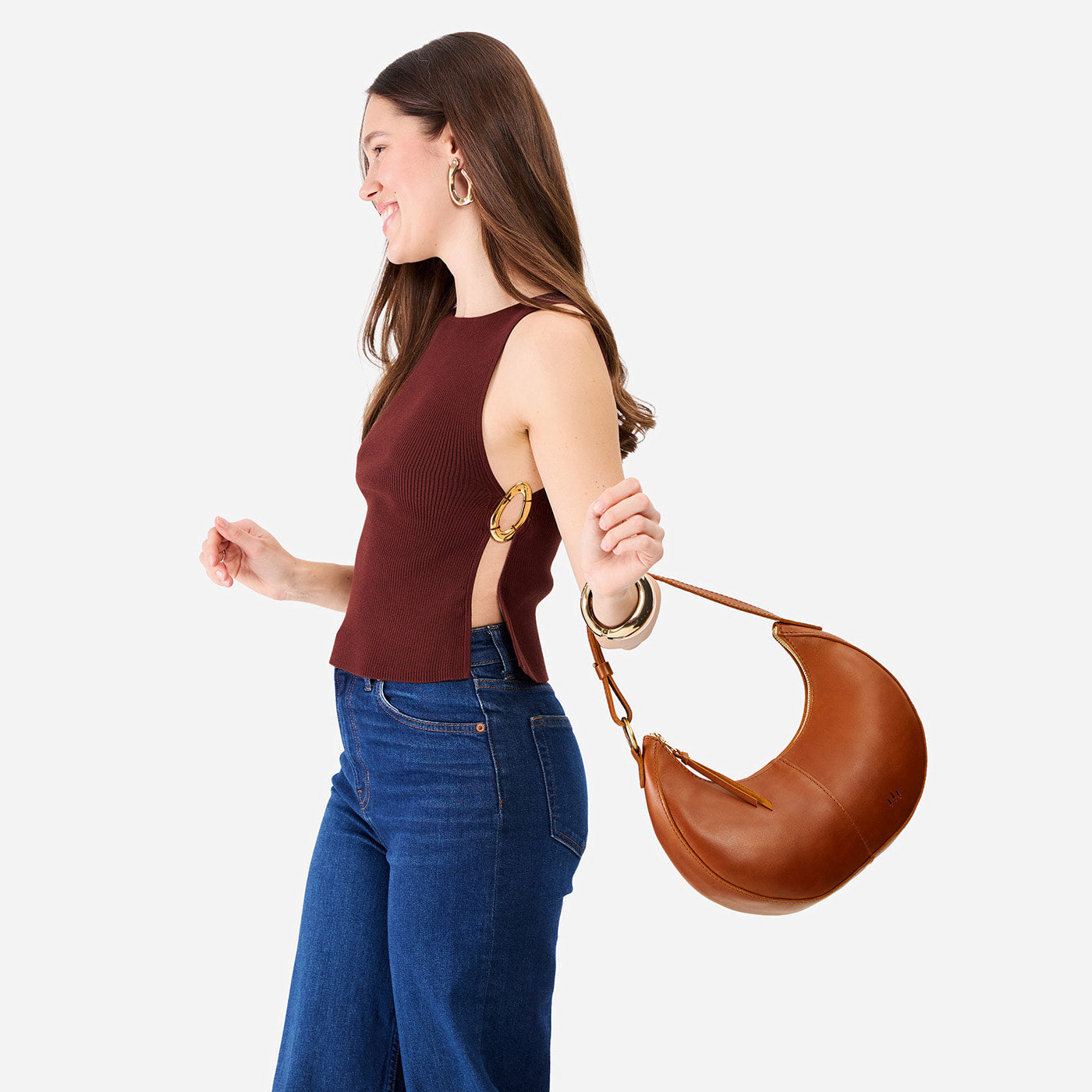 Honey*Classic | Crescent shaped shoulder bag with zipper closure and adjustable strap