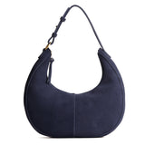 Alaska Blue Large | Crescent shaped shoulder bag with zipper closure and adjustable strap