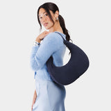 Alaska Blue Large | Crescent shaped shoulder bag with zipper closure and adjustable strap