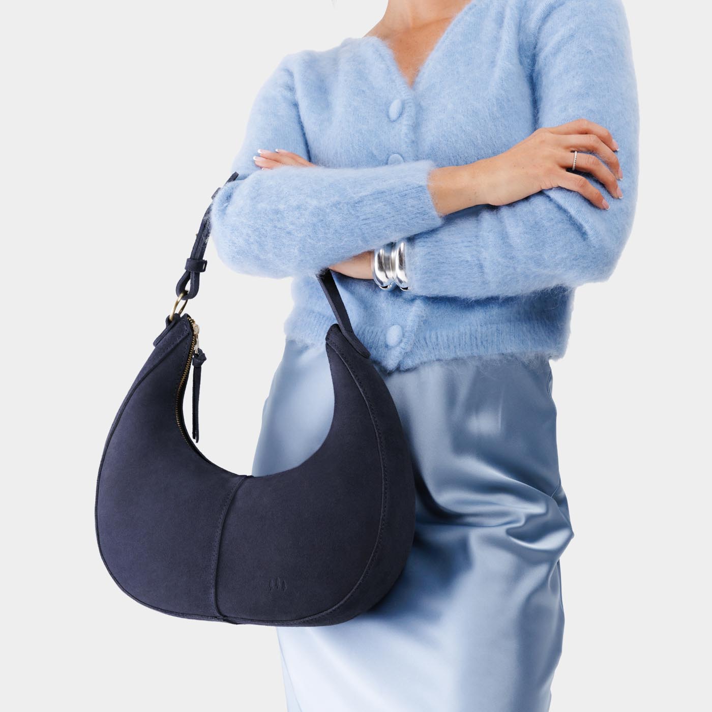 Alaska Blue*Large | Crescent shaped shoulder bag with zipper closure and adjustable strap